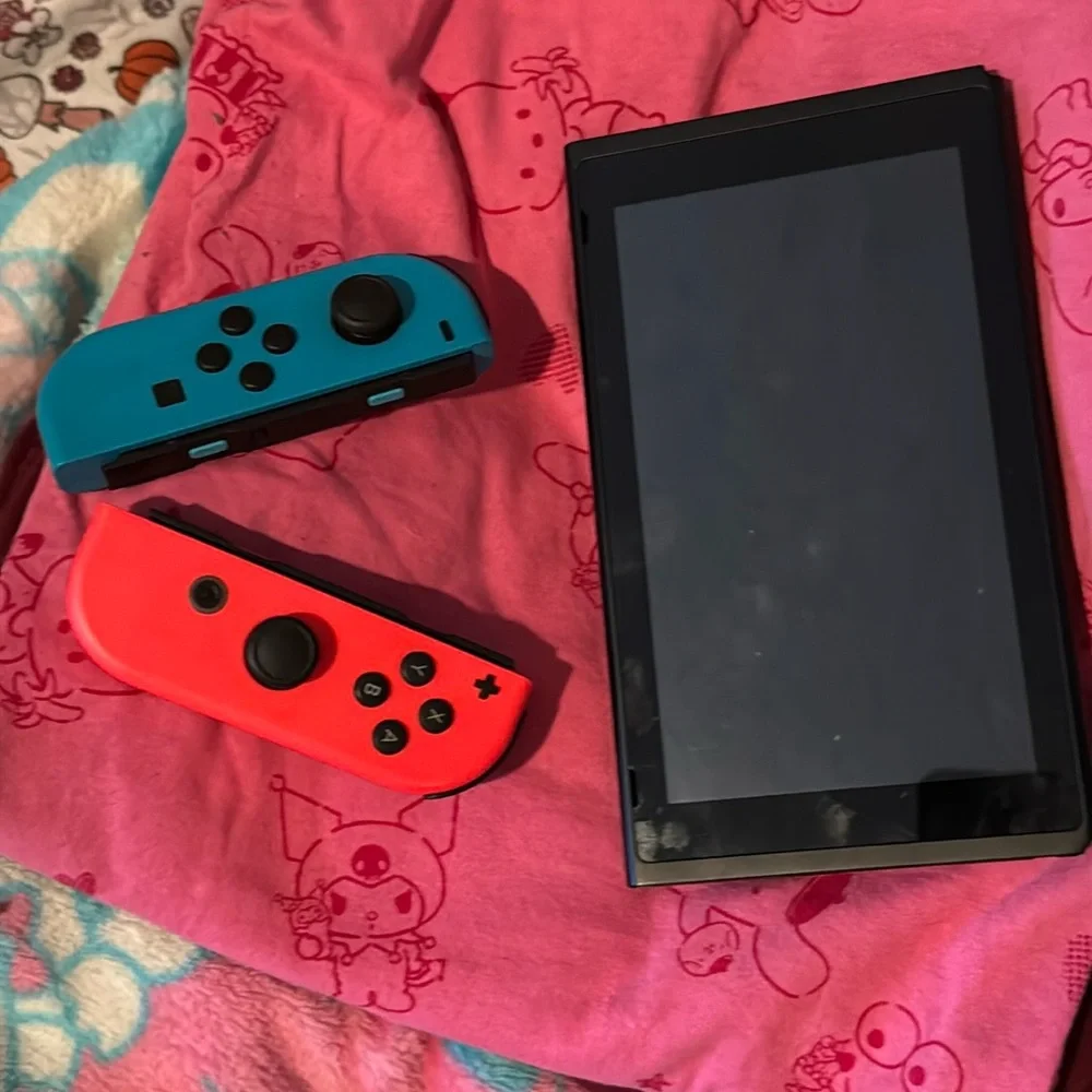 Nintendo switch handheld gaming system like brand new barley ever used